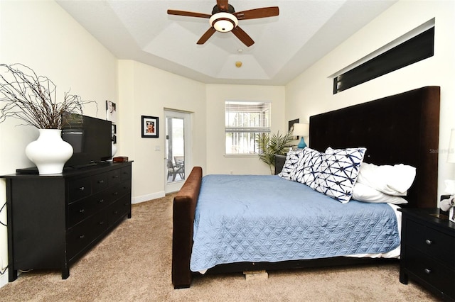 436 Skyview Pl, Chuluota, FL 32766 - bedroom with light colored carpet, a tray ceiling, and ceiling fan