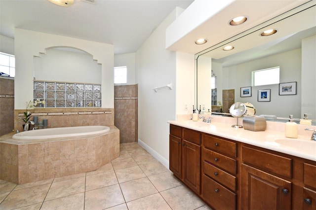 436 Skyview Pl, Chuluota, FL 32766 - bathroom with plenty of natural light, a bath, double vanity, and tile patterned floors