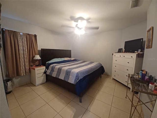 8509 SW 136th Loop, Ocala, FL 34473 - bedroom with light tile patterned floors and a ceiling fan