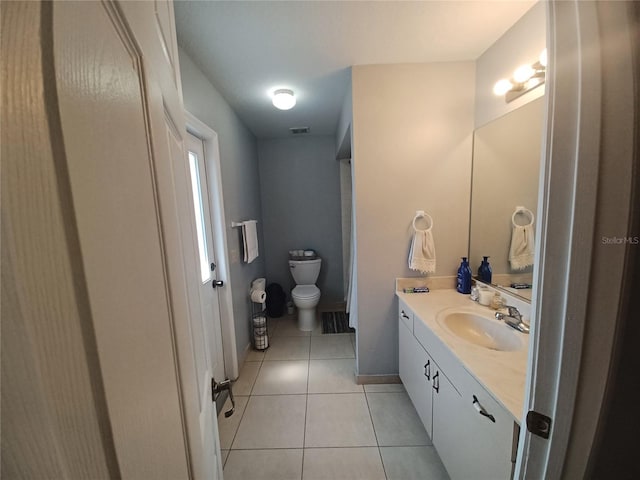 8509 SW 136th Loop, Ocala, FL 34473 - bathroom featuring tile patterned flooring and vanity