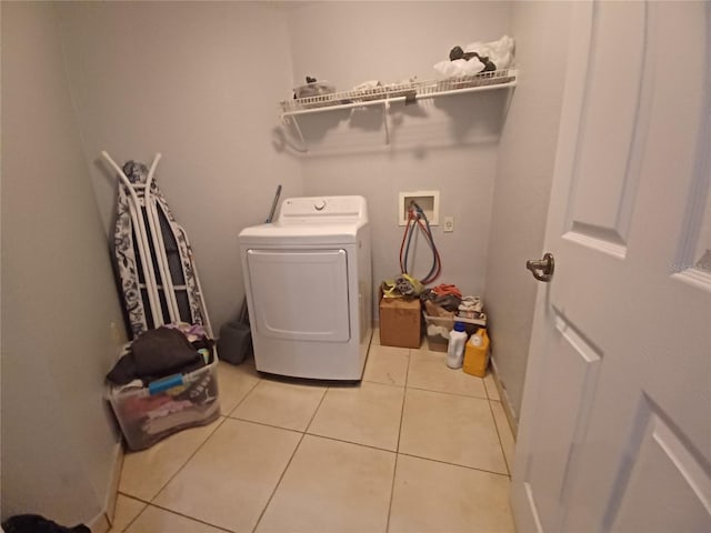 8509 SW 136th Loop, Ocala, FL 34473 - washroom with washer / dryer and tile patterned flooring