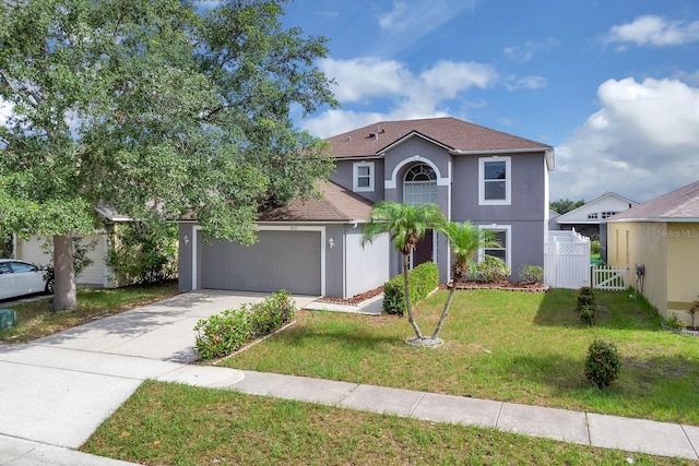 16053 Wilkinson Dr, Clermont, FL 34714 - traditional-style home featuring stucco siding, driveway, a gate, an attached garage, and a shingled roof