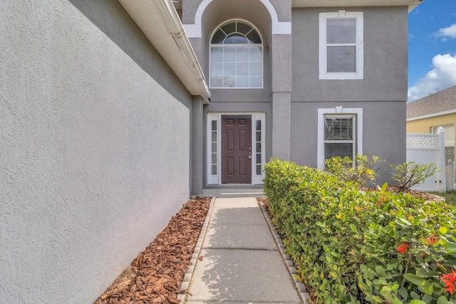 16053 Wilkinson Dr, Clermont, FL 34714 - entrance to property featuring stucco siding