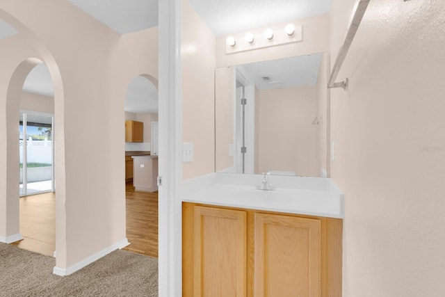 16053 Wilkinson Dr, Clermont, FL 34714 - bathroom featuring vanity and baseboards
