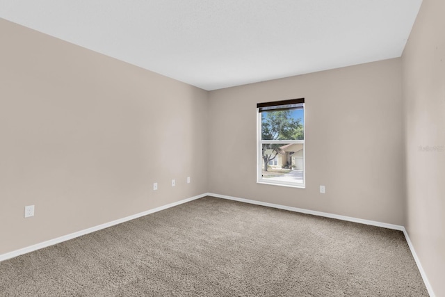 16053 Wilkinson Dr, Clermont, FL 34714 - carpeted spare room with baseboards