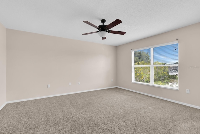 16053 Wilkinson Dr, Clermont, FL 34714 - spare room with a ceiling fan and carpet flooring