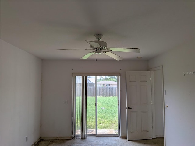 1140 Belmar Ave, Port Charlotte, FL 33948 - doorway featuring ceiling fan and baseboards