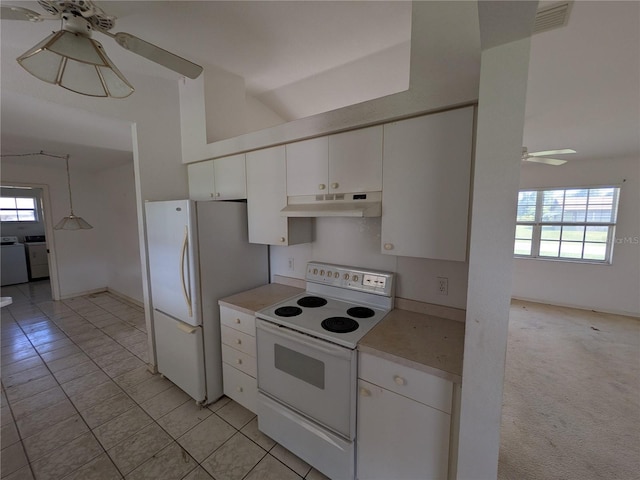 1140 Belmar Ave, Port Charlotte, FL 33948 - kitchen featuring white appliances, ceiling fan, under cabinet range hood, light countertops, and healthy amount of natural light