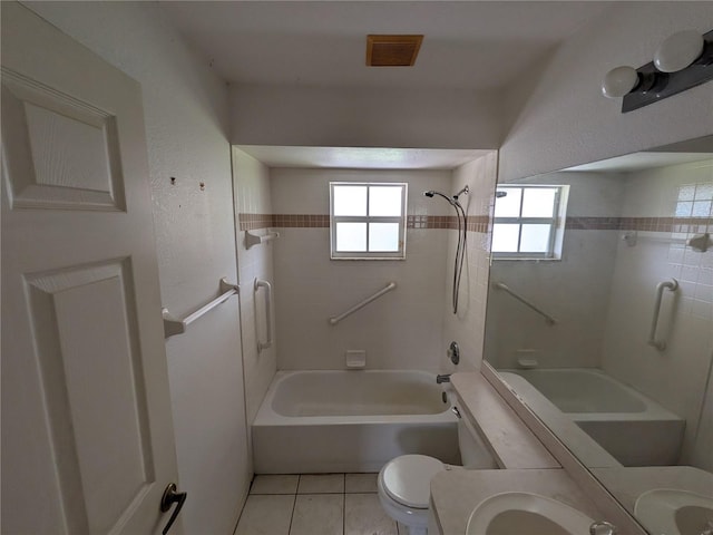 1140 Belmar Ave, Port Charlotte, FL 33948 - bathroom with shower / tub combination, tile patterned flooring, and vanity