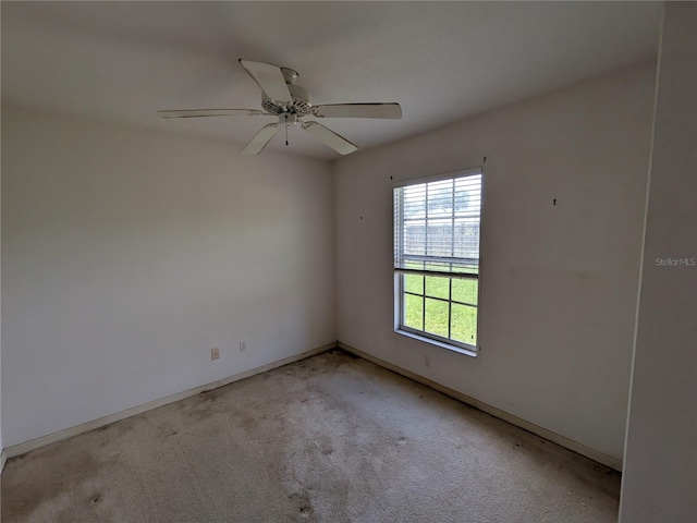 1140 Belmar Ave, Port Charlotte, FL 33948 - unfurnished room with light colored carpet and a ceiling fan