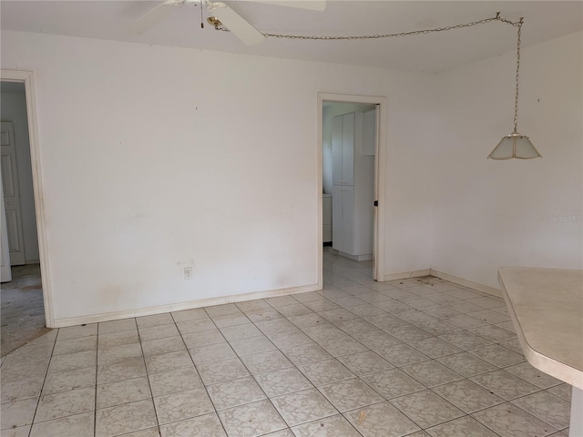 1140 Belmar Ave, Port Charlotte, FL 33948 - empty room featuring ceiling fan and light tile patterned floors