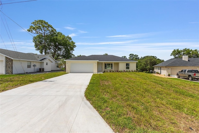 13031 NE 7th Loop, Silver Springs, FL 34488 - ranch-style house with concrete driveway, an attached garage, a front yard, and stucco siding