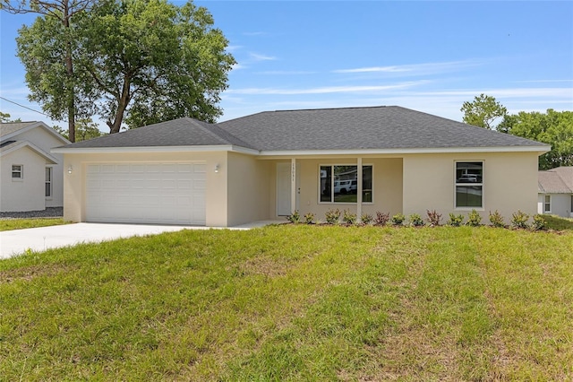 13031 NE 7th Loop, Silver Springs, FL 34488 - single story home with a garage, concrete driveway, a front lawn, stucco siding, and roof with shingles