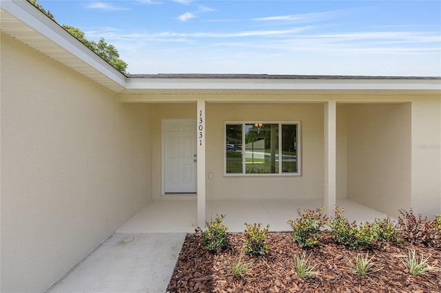 13031 NE 7th Loop, Silver Springs, FL 34488 - entrance to property with stucco siding