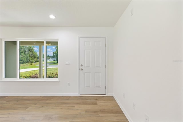 13031 NE 7th Loop, Silver Springs, FL 34488 - entrance foyer with light wood-style floors and recessed lighting
