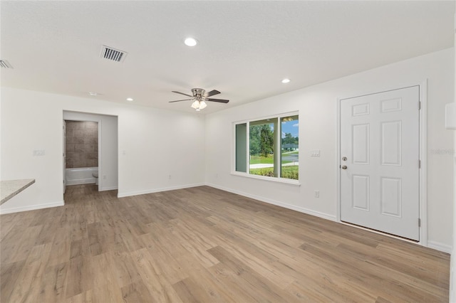 13031 NE 7th Loop, Silver Springs, FL 34488 - spare room featuring ceiling fan, light wood-type flooring, and recessed lighting