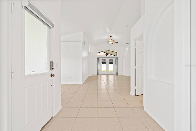 9003 Pecky Cypress Way, Orlando, FL 32836 - corridor with light tile patterned flooring and french doors