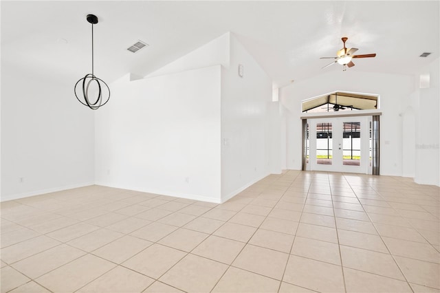 9003 Pecky Cypress Way, Orlando, FL 32836 - spare room featuring light tile patterned floors, high vaulted ceiling, and ceiling fan