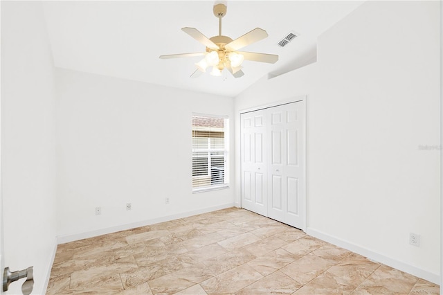 9003 Pecky Cypress Way, Orlando, FL 32836 - unfurnished bedroom with vaulted ceiling, ceiling fan, and a closet