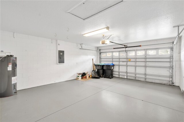 9003 Pecky Cypress Way, Orlando, FL 32836 - garage featuring electric panel, electric water heater, a garage door opener, and concrete block wall