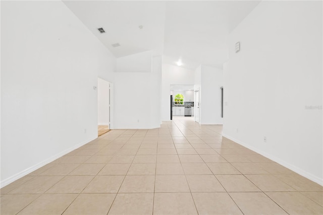 9003 Pecky Cypress Way, Orlando, FL 32836 - empty room featuring high vaulted ceiling and light tile patterned floors