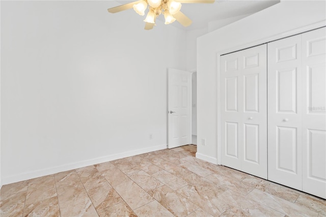 9003 Pecky Cypress Way, Orlando, FL 32836 - unfurnished bedroom featuring a closet and a ceiling fan