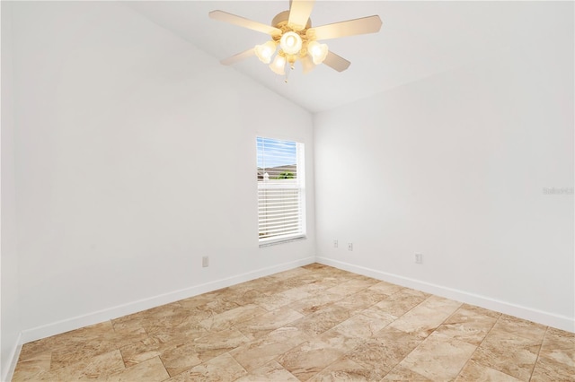 9003 Pecky Cypress Way, Orlando, FL 32836 - spare room with lofted ceiling, a ceiling fan, and stone finish floors