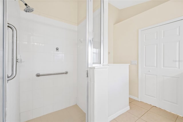9003 Pecky Cypress Way, Orlando, FL 32836 - bathroom featuring a stall shower and tile patterned floors