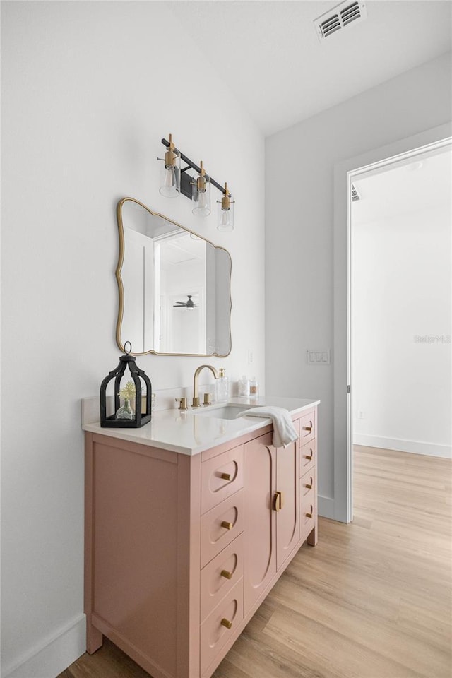 2212 SW 210th Ave, Dunnellon, FL 34431 - bathroom featuring vanity and wood finished floors