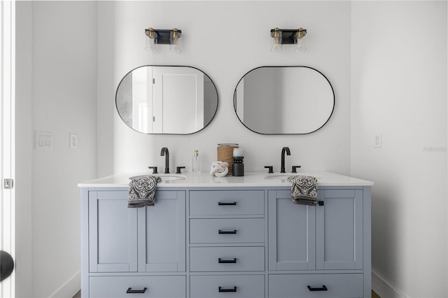 2212 SW 210th Ave, Dunnellon, FL 34431 - bathroom featuring double vanity and baseboards