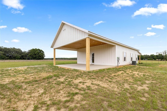 2212 SW 210th Ave, Dunnellon, FL 34431 - view of home's exterior with a patio and board and batten siding