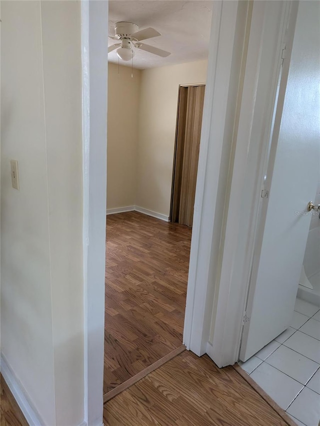 417 Shore Rd, Nokomis, FL 34275 - corridor with light wood-type flooring and baseboards