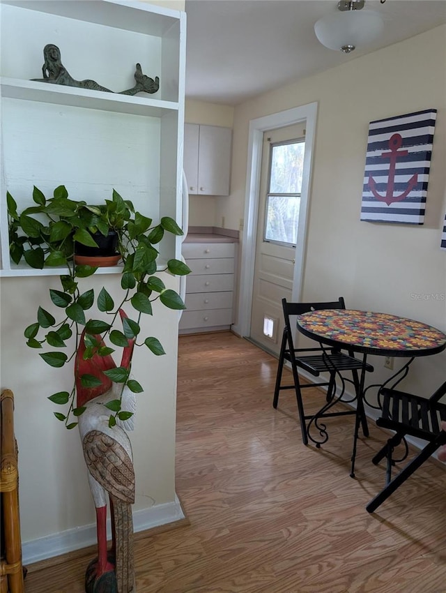 417 Shore Rd, Nokomis, FL 34275 - dining space with wood finished floors
