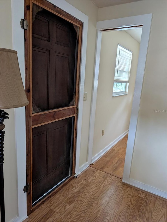417 Shore Rd, Nokomis, FL 34275 - detailed view of wood finished floors and baseboards