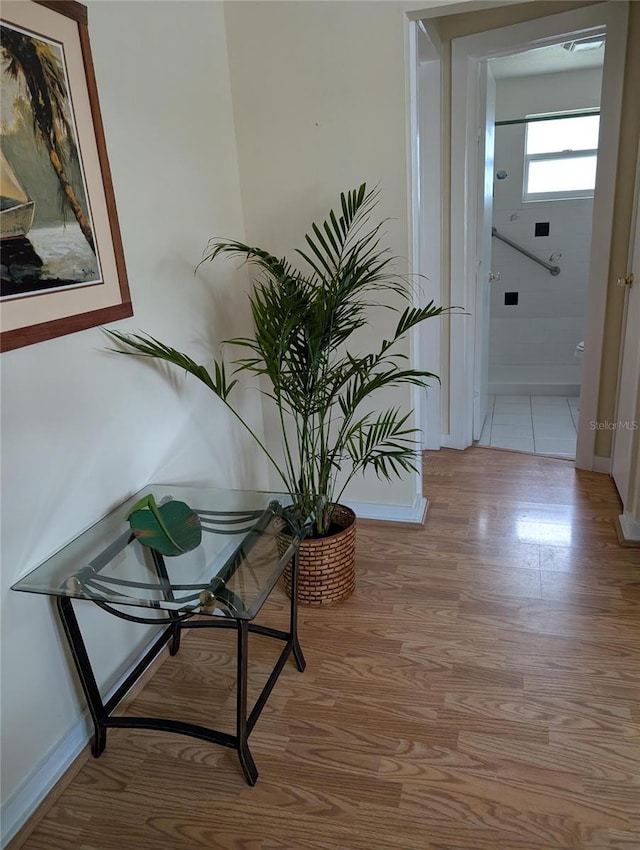 417 Shore Rd, Nokomis, FL 34275 - hall featuring baseboards and light wood-style floors