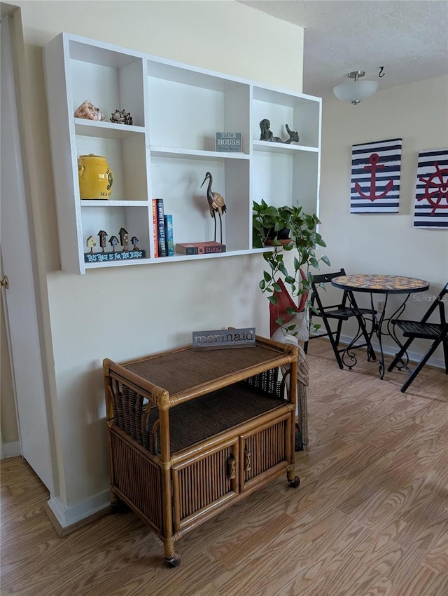 417 Shore Rd, Nokomis, FL 34275 - living area with wood finished floors and baseboards