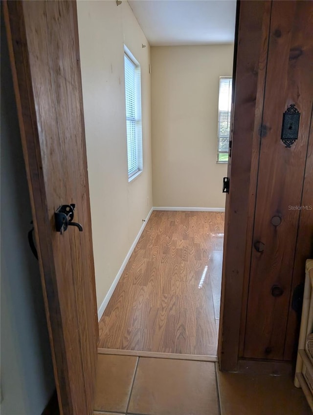 417 Shore Rd, Nokomis, FL 34275 - hall with baseboards and wood finished floors