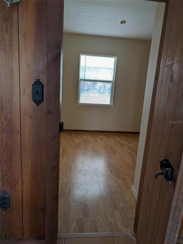 417 Shore Rd, Nokomis, FL 34275 - spare room featuring wood finished floors and baseboards