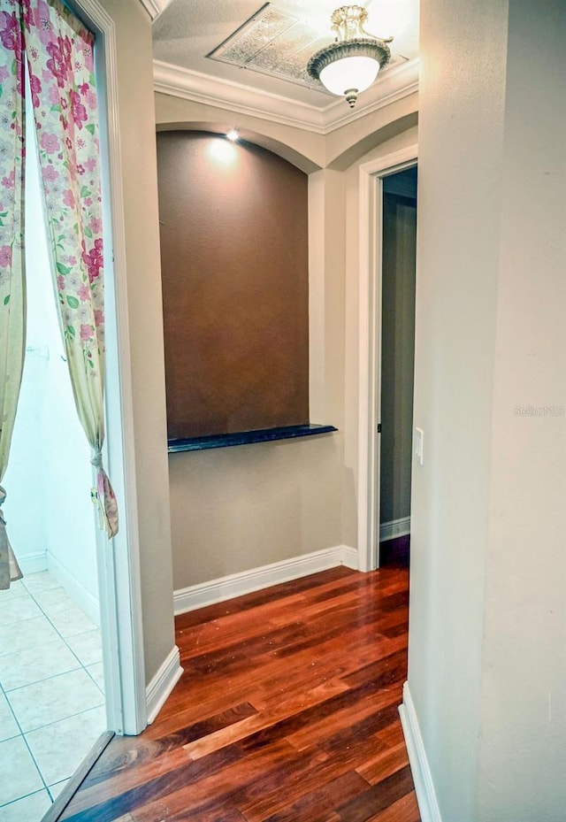 3504 Shorewood Dr, Kissimmee, FL 34746 - corridor featuring wood finished floors and ornamental molding