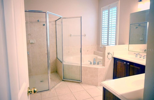 3504 Shorewood Dr, Kissimmee, FL 34746 - full bath featuring vanity, a bath, a shower stall, and tile patterned floors