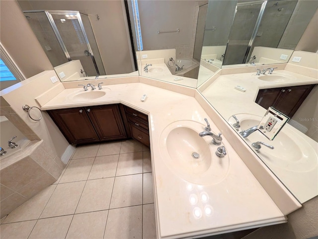 3504 Shorewood Dr, Kissimmee, FL 34746 - bathroom with double vanity, tile patterned floors, and a bath