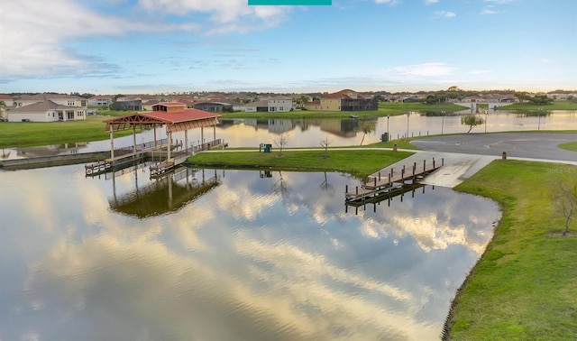 3504 Shorewood Dr, Kissimmee, FL 34746 - water view featuring a boat dock, nearby suburban area, and boat lift