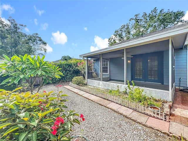 1751 Chatham Cir, Apopka, FL 32703 - view of side of property featuring a ceiling fan and a sunroom