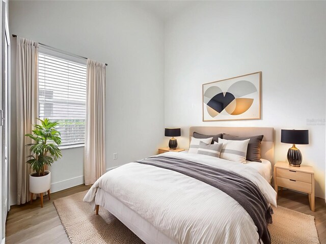 2092 Switch Grass Cir, Ocoee, FL 34761 - bedroom with light wood finished floors