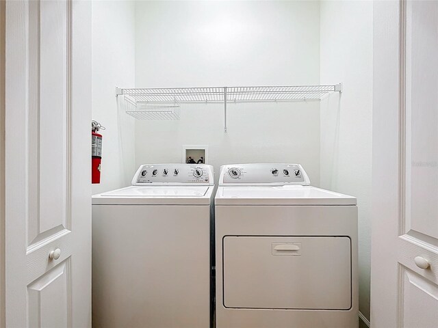 2092 Switch Grass Cir, Ocoee, FL 34761 - laundry area with washer and clothes dryer
