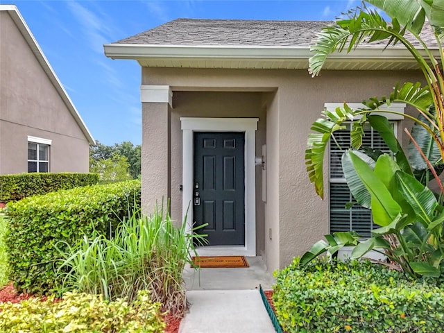 2092 Switch Grass Cir, Ocoee, FL 34761 - doorway to property featuring stucco siding