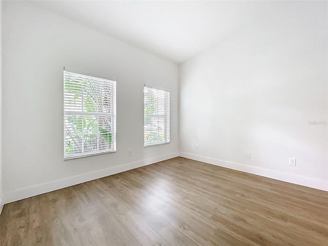 2092 Switch Grass Cir, Ocoee, FL 34761 - empty room featuring wood finished floors and baseboards
