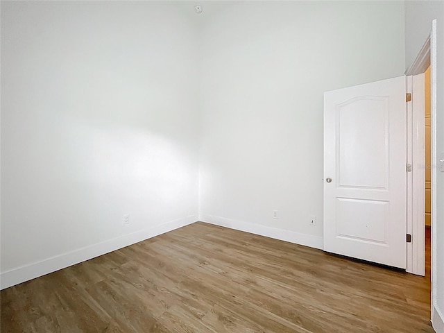 2092 Switch Grass Cir, Ocoee, FL 34761 - unfurnished room with wood finished floors and baseboards