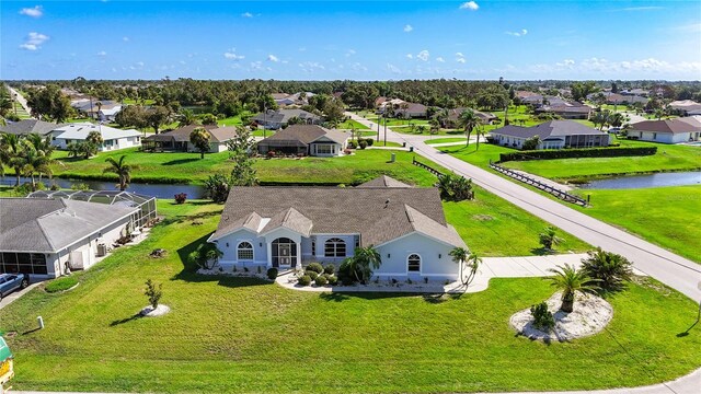 142 Broadmoor Ln, Rotonda West, FL 33947 - aerial view of residential area featuring a nearby body of water