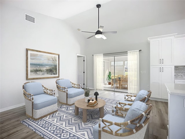 142 Broadmoor Ln, Rotonda West, FL 33947 - living area featuring light wood-style floors, a ceiling fan, and high vaulted ceiling